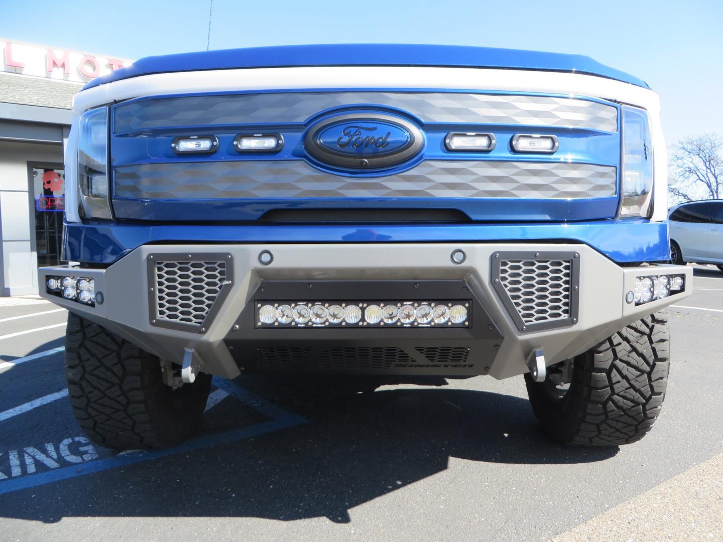 2022 BLUE /BLACK Ford F-150 Lariat Crew Cab 4WD (1FT6W1EV6NW) , located at 2630 Grass Valley Highway, Auburn, CA, 95603, (530) 508-5100, 38.937893, -121.095482 - Tired of gas prices and still want to look cool? Check out this Ford Lightning featuring a RC level kit, Nitto Ridge Grappler tires, Fuel Rebel wheels, Sinister front and rear bumpers, Baja Designs leds, Rigid Industries Leds, Bakflip F1, and window tint. - Photo#10